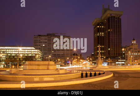 MADRID - MARCH 9: Fountain and Plaza Colon in morning dusk in March 9, 2013 in Spain. Stock Photo