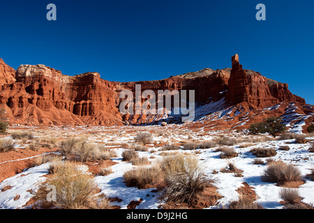 Chimney Rock viewed from Chimney Rock trail in the morning with snow on the ground, Capitol Reef National Park, Utah, United States of America Stock Photo