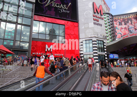 Las Vegas Nevada,The Strip,South Las Vegas Boulevard,escalator,steps stairs staircase,Miracle Mile Shops,Planet Hollywood,signs,street,NV130330079 Stock Photo