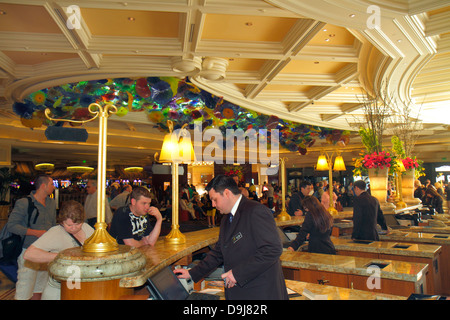 Las Vegas Nevada,The Strip,South Las Vegas Boulevard,Bellagio,hotel,casino,lobby,ceiling,glass,Chihuly,guests,front desk check in reception reservatio Stock Photo