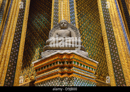 Buddha Statue on Phra Mondop, Wat Phra Kaew, Temple of the Emerald Buddha Complex, Bangkok, Thailand Stock Photo