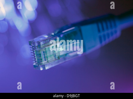 Network cable with fiber optical background Stock Photo