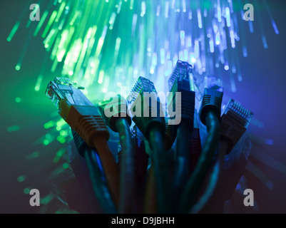 Network cables with fiber optical background Stock Photo