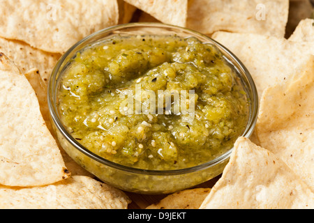 Fresh Homemade Salsa Verde with tortilla chips Stock Photo