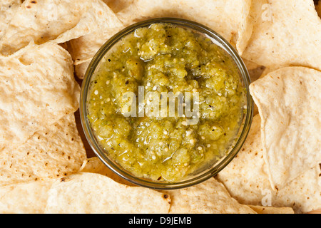 Fresh Homemade Salsa Verde with tortilla chips Stock Photo