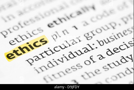 The word ethics highlighted in a dictionary Stock Photo