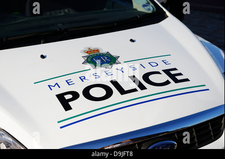 Merseyside police logo on bonnet of police car. Stock Photo