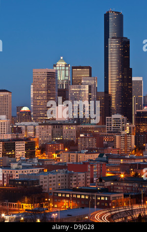 Seattle cityscape at night dominated with the Columbia Tower, as seen from Dr. Jose Rizal Park, Seattle, Washington. Stock Photo