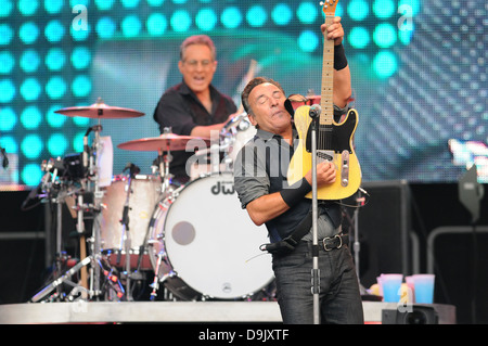 Bruce Springsteen plays guitar during the concert at the Ricoh Arena, Coventry, UK.  Part of his Wrecking Ball tour. Stock Photo