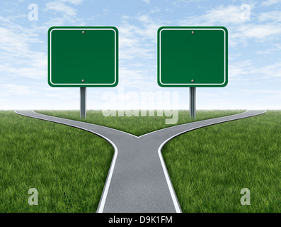 Cross roads with two blank road signs for copy space as a business concept and strategy symbol representing the difficult choices and challenges when selecting the right strategic path for financial planning. Stock Photo
