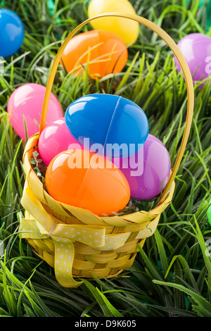 Colored Plastic Easter Eggs with chocolate inside Stock Photo