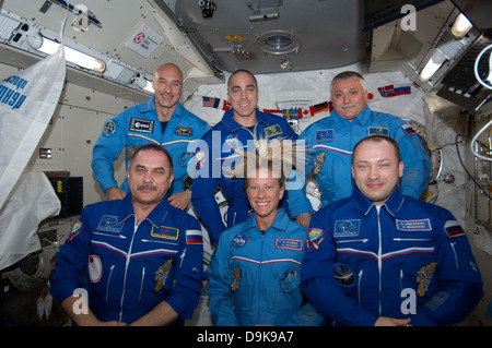 Floating inside the Kibo laboratory in the International Space Station, the six Expedition 36 crew members videotape a tribute to cosmonaut Valentina Tereshkova, who on June 16 will mark the 50th anniversary of her 1963 launch aboard the Soviet Vostok-6 spacecraft June 8, 2013. On the bottom row from left are Expedition 36 Commander Pavel Vinogradov of Russia's Federal Space Agency and Flight Engineers Karen Nyberg of NASA and Alexander Misurkin of Roscosmos. On top are from left Flight Engineers Luca Parmitano of the ESA, Chris Cassidy of NASA and Fyodor Yurchikhin of Roscosmos. Stock Photo