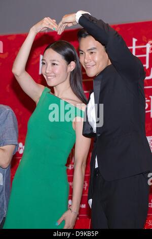 Eddie Peng and Bai Baihe attended closing ceremony of Chinese Film Festival in Seoul, South Korea on Thursday June 20, 2013. Stock Photo