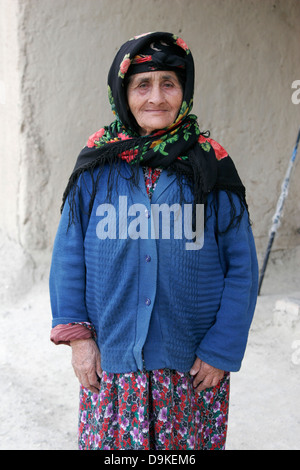 Elderly Tajik woman wearing headscarf, Marguzir Lakes, Fan mountains, Tajikistan, Central Asia Stock Photo