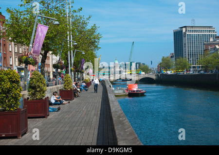 Riverside Liffey views along Bachelor's Walk street central Dublin Ireland Europe Stock Photo