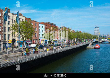 Riverside Liffey views along Bachelor's Walk street central Dublin Ireland Europe Stock Photo