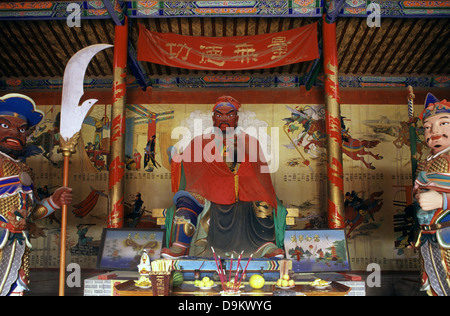 Praying hall in a temple at Jiayu Pass or Jiayuguan which is the first pass at the west end of the Great Wall of China which was built by the Ming Dynasty, in the 14th century, located southwest of the city of Jiayuguan in Gansu province Northern China Stock Photo