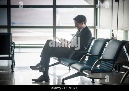 Businessman using digital tablet Stock Photo