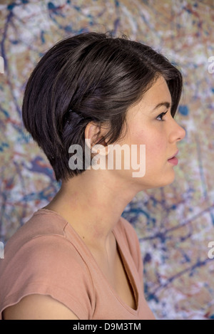 Confident attractive 16 year old girl with asymmetrical pixie cut hairstyle Stock Photo