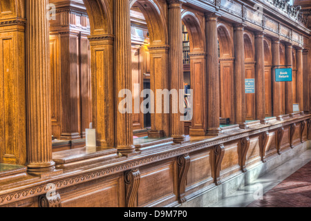 The book return at the center of Rose Main Reading Room in the main branch of the New York Public Library Stock Photo