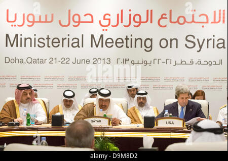 Foreign Minister of Saudi-Arabia (L-R) Prince Saud al-Faisal bin Abdulaziz al Saud, Foreign Minister of Qatar Hamad bin Jassim bin Jaber al-Thani, and US Secretary of State John Kerry take part in the foreign ministers meeting of the Syria contact group in Doha, Qatar, 22 June 2013. The Friends of Syria group of countries are meeting in Qatar to discuss offering substantial military support to the rebels fighting to oust President Bashar al-Assad. The 11-country group is made up of Britain, France, the United States, Germany, Italy, Jordan, Qatar, Saudi Arabia, Turkey, Egypt and the United Ara Stock Photo