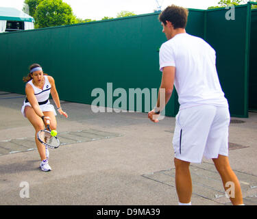 All England Lawn Tennis Club, Wimbledon, London, UK. 21st June 2013.  Marion Bartoli seen in training (finding anywhere in the grounds of the All England Club) before the 2013 Wimbledon Championship. Credit:  Graham Eva/Alamy Live News Stock Photo