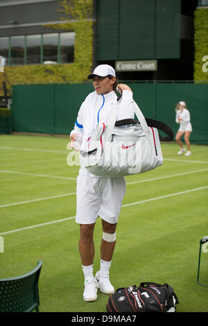 Wimbledon, London, UK. 22nd June 2013. The Wimbledon Tennis Championships 2013 held at The All England Lawn Tennis and Croquet Club, London, England, UK.    Fresh from his Roland Garros triumph, No 5 seed Rafael Nadal practices on Wimbledon's Court 14. Credit:  Duncan Grove/Alamy Live News Stock Photo