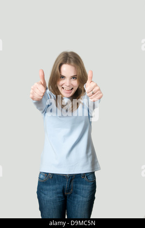 Beautiful girl with two hand Thumbs up hand Stock Photo