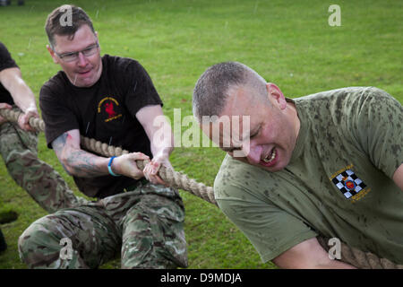 British Military Fitness, Tug of War team at Preston UK, 22 June 2013. 103rd (Lancashire Artillery Volunteers) Regiment Royal Artillery at the Preston Military Show at Fulwood Barracks, Preston, Lancashire .   Servicemen, cadets and veterans represent the Royal Navy, the Army and the Royal Air Force from all over the North West: Cheshire, Cumbria, Lancashire, Merseyside and Greater Manchester.  The Preston Military Show is the largest display by the armed forces in the North West of England. Stock Photo
