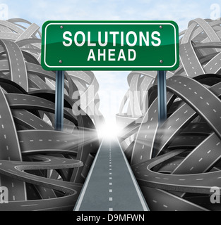 Solutions ahead and business answers concept with a green highway sign as an icon of breaking out from a confusion of tangled roads with a clear strategic path. Stock Photo