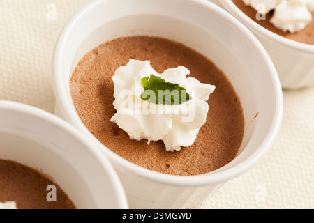 Rich Gourmet Homemade Chocolate Mousse Dessert with whipped cream Stock Photo