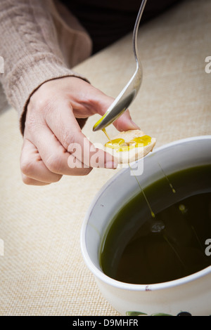 Olive oil sampling near Serrano, Italy Stock Photo