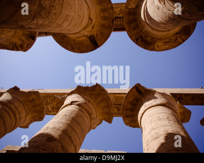 Looking upwards within the Great Hypostyle Hall at the Temple of Karnak, Luxor, Egypt Stock Photo