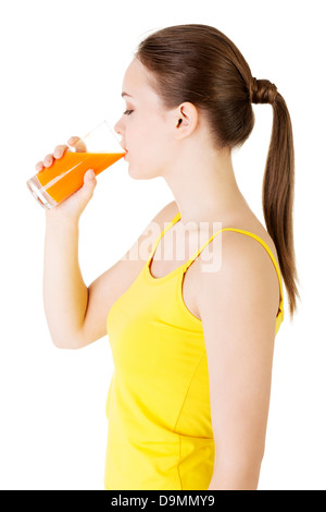 Young woman with the carrots juice , isolated on white. Stock Photo