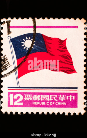 chinese postage stamp in studio setting Stock Photo