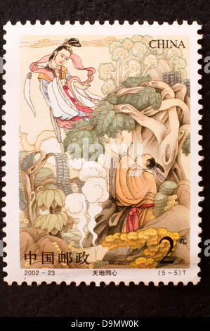 chinese postage stamp in studio setting Stock Photo