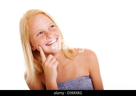 cute freckled pre teen girl looking up Stock Photo