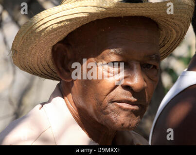 An 80-year old musician wears a traditional straw hat  in the town of Cienfuegos, Cuba, 14 April 2013. Photo:Peter Zimmermann Stock Photo