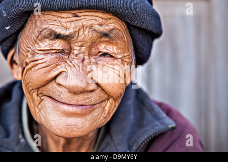 Old woman from Tibet smiling Stock Photo