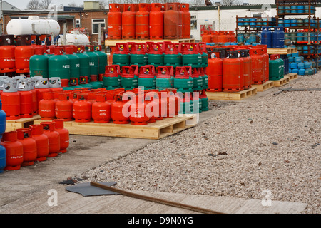 Domestic propane gas bottles in storage at a distribution centre Stock Photo