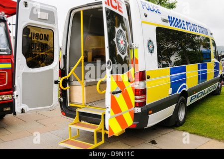 Large van converted into a mobile police station for use in emergency situations Stock Photo