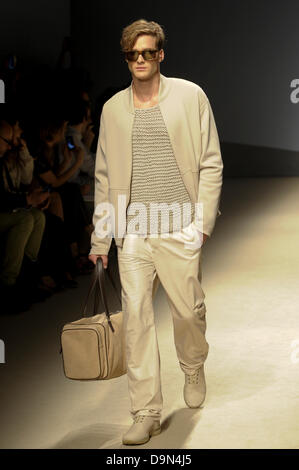 Milan, Italy. 23 June 2013. A model on the catwalk during the presentation of the Trussardi Mens Spring Summer 2013 collection at Milan Fashion Week. Credit:  Gaetano Piazzolla/Alamy Live News Stock Photo