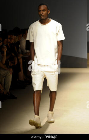 Milan, Italy. 23 June 2013. A model on the catwalk during the presentation of the Trussardi Mens Spring Summer 2013 collection at Milan Fashion Week. Credit:  Gaetano Piazzolla/Alamy Live News Stock Photo