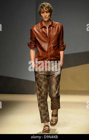 Milan, Italy. 23 June 2013. A model on the catwalk during the presentation of the Trussardi Mens Spring Summer 2013 collection at Milan Fashion Week. Credit:  Gaetano Piazzolla/Alamy Live News Stock Photo