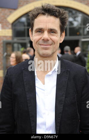 German director Tom Tykwer arrives at the ceremony for the 2013 German Camera Prize in Cologne, Germany, 22 June 2013. Photo: HORTS GALUSCHKA Stock Photo