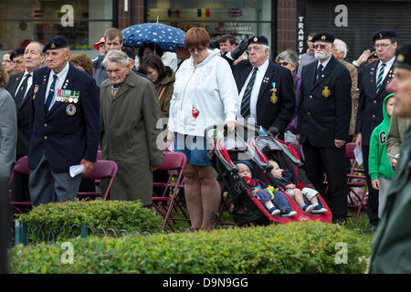 Northampton UK. Memorial Garden Abington Square. 23rd June 2013.The drumhead service of commemoration to mark the 60th anniversary of the armistice of the Korean War (1950-53). Northampton Borough Council, the Royal British Legion and the Korean Veterans Association hold a static parade in the Memorial Garden. The standards of military units draped over drums piled to create an altar Credit:  Keith J Smith./Alamy Live News Stock Photo