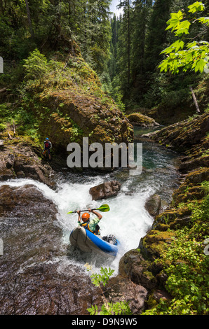 Paddling an inflatable kayak down a waterfall, Fall Creek 