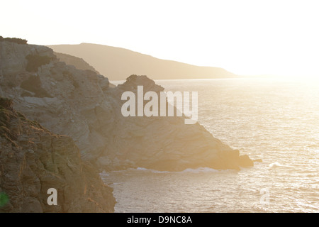 Rocky coast at sunset. Near Agia Pelagia village, Crete Island, Greece, Europe. Stock Photo