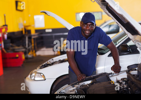 male African car mechanic inside workshop Stock Photo