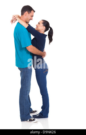 happy loving couple embracing over white background Stock Photo